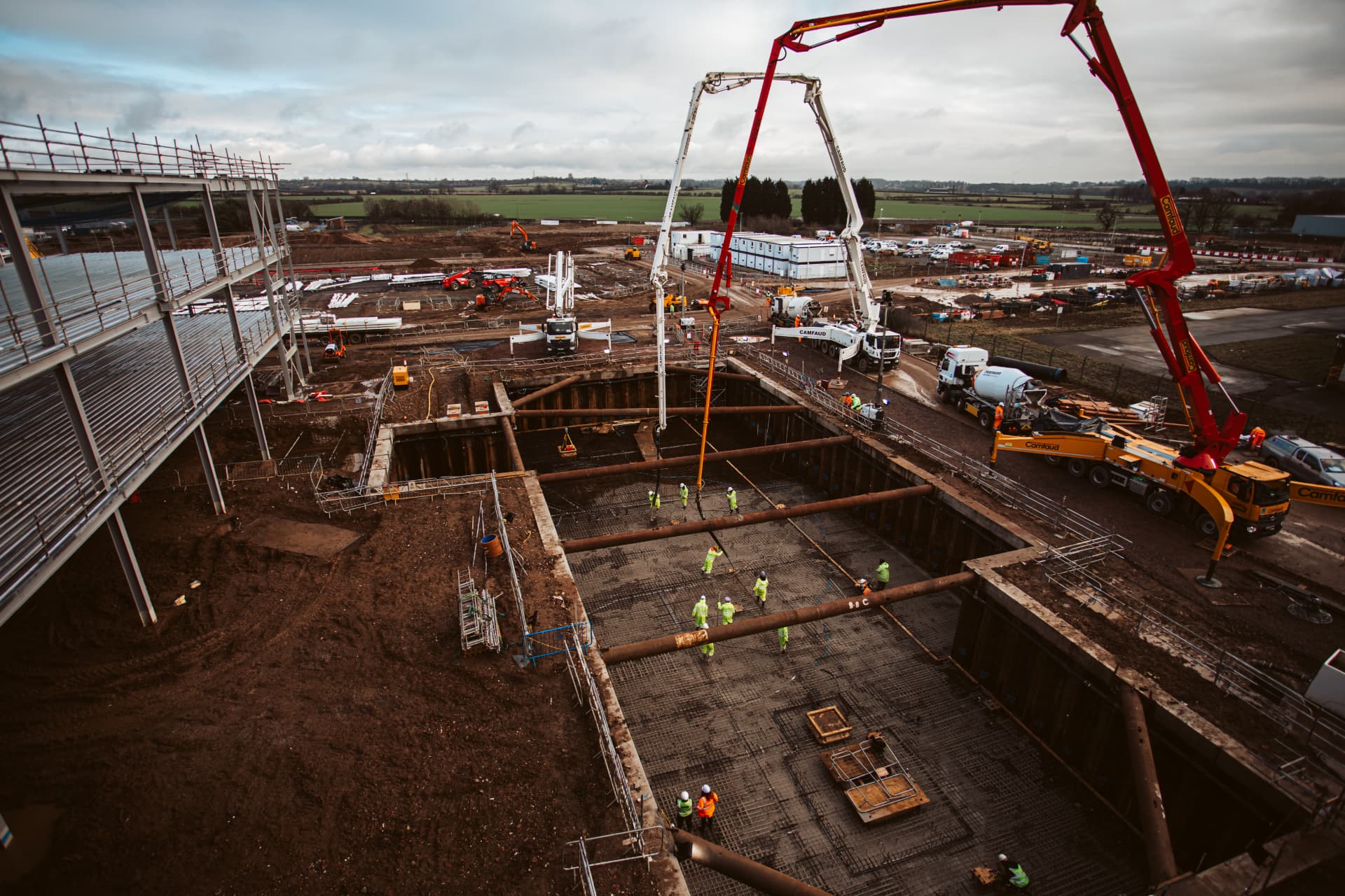 Aerial view of a McCoy Contractors civil engineering site with concrete pump