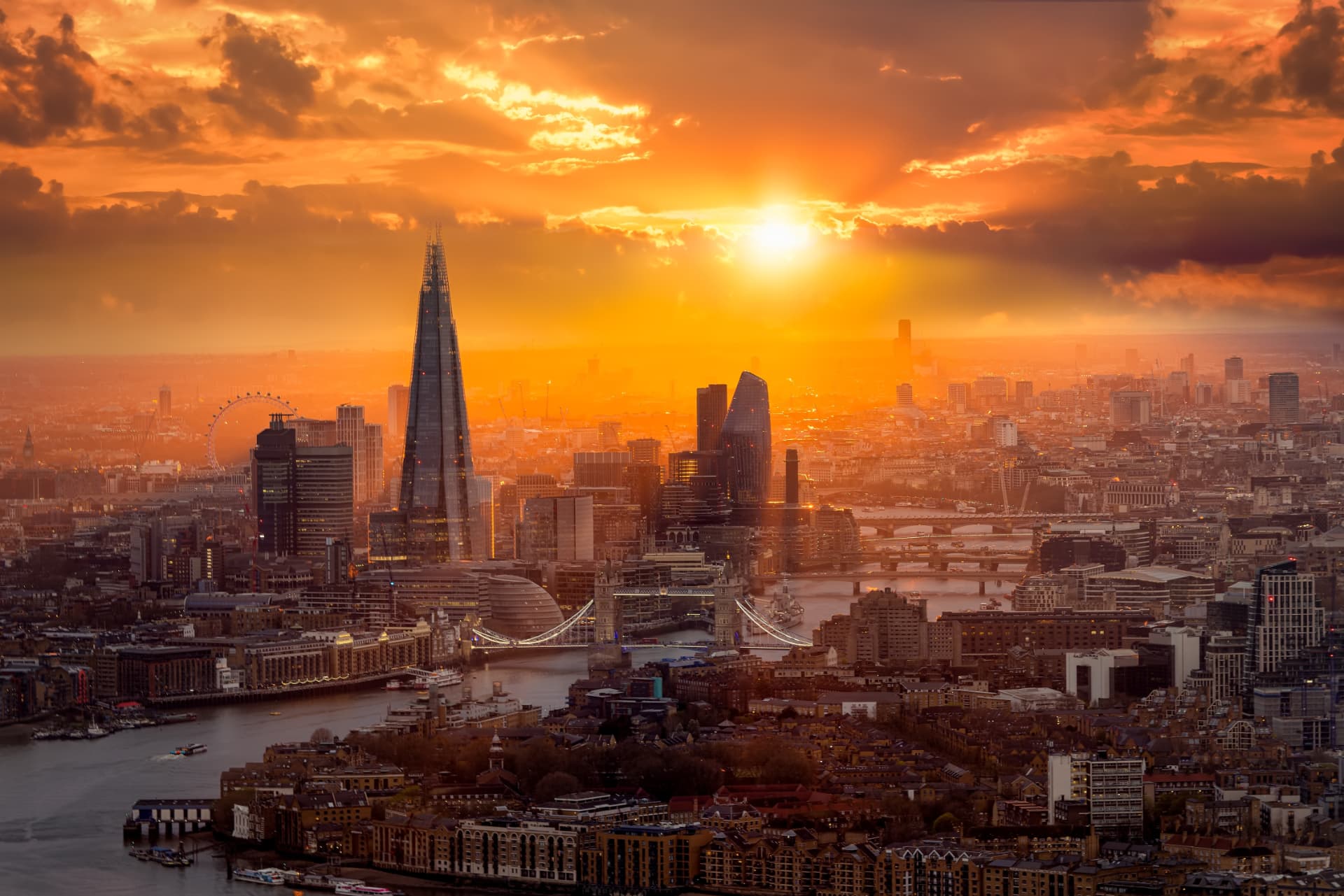 London skyline at sunset, viewed across the Thames
