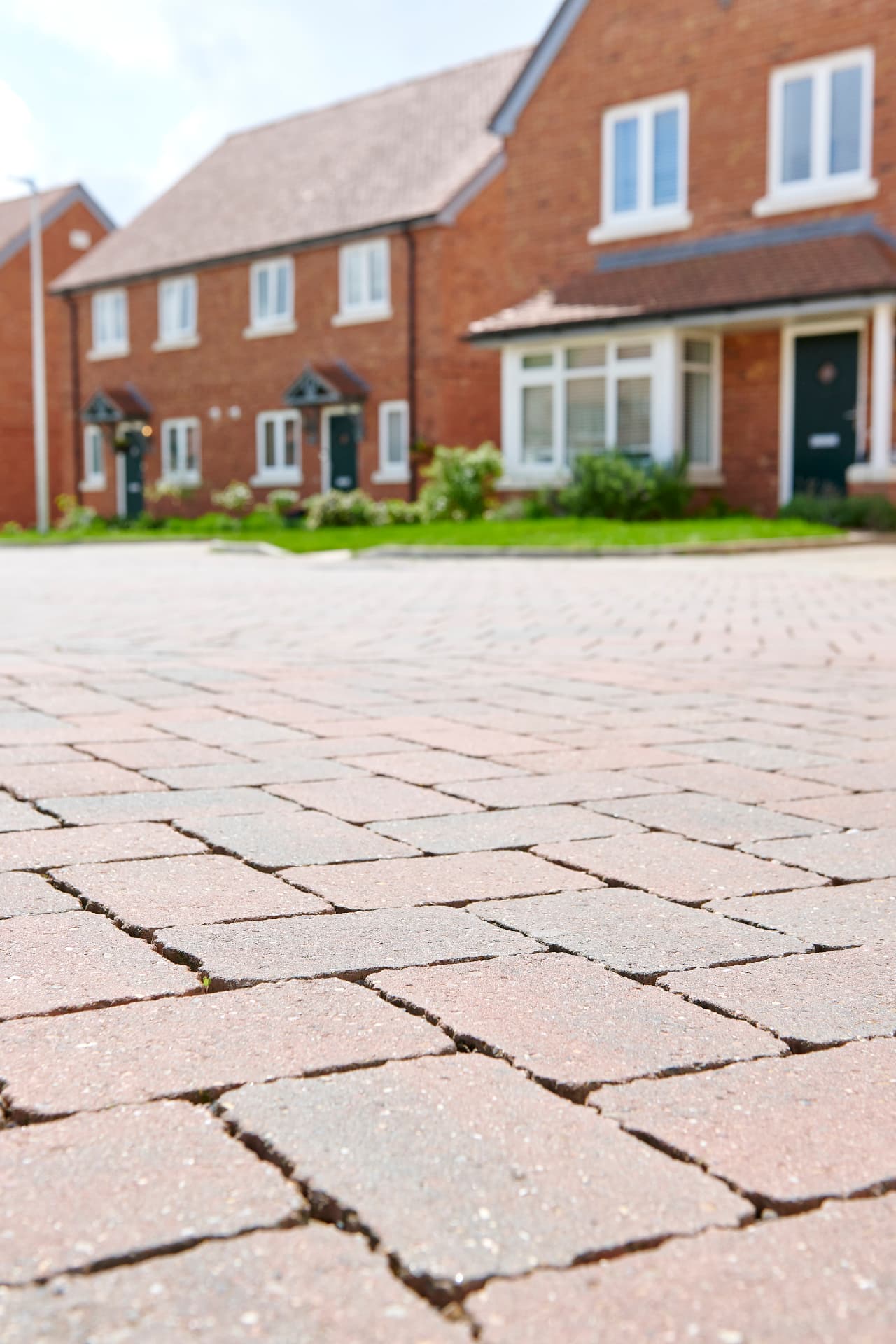Alpha Flow Brindle permeable block paving on a new-build housing development