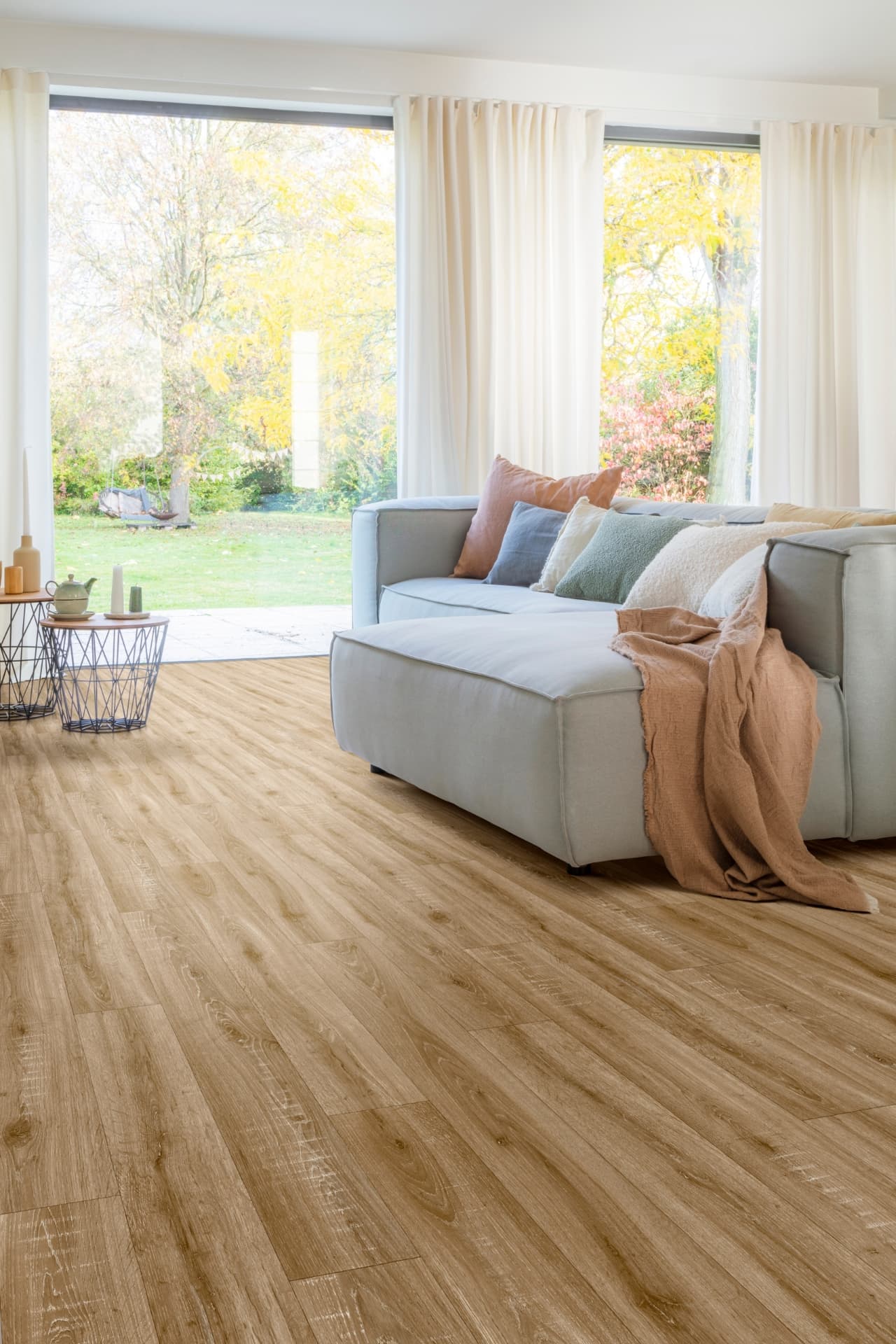 Furlong Flooring wood-effect planks in a garden-facing living room